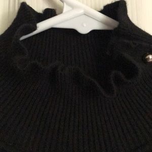 Black Turtleneck With Ruffle Detail